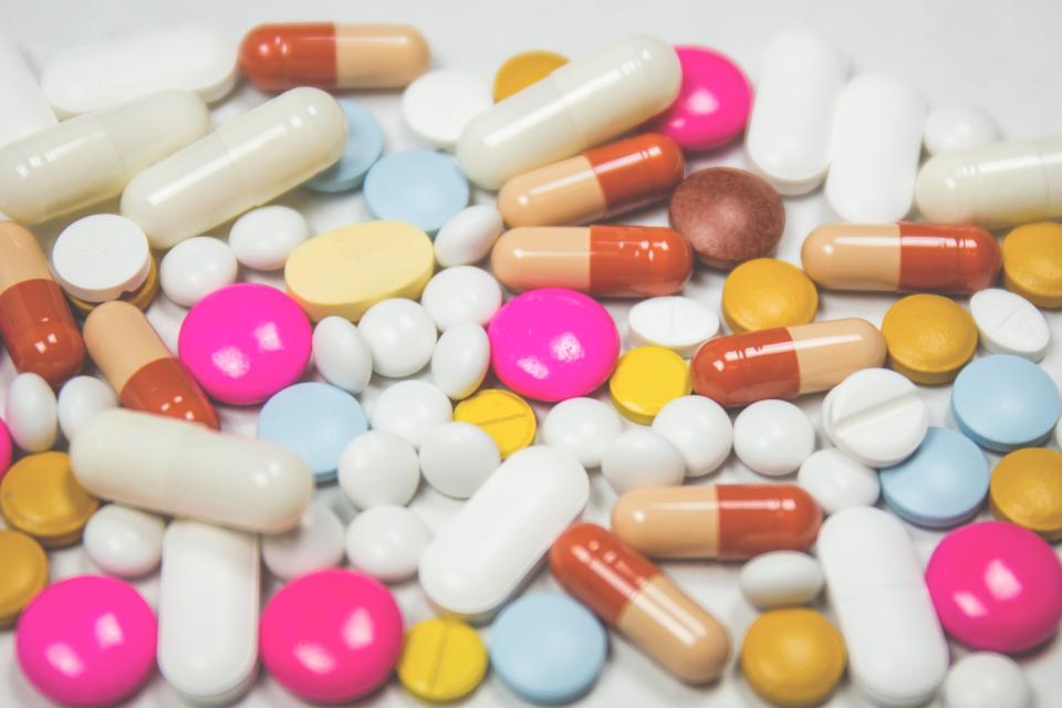 Medication bottles stored neatly on a shelf, illustrating safe home storage of prescriptions